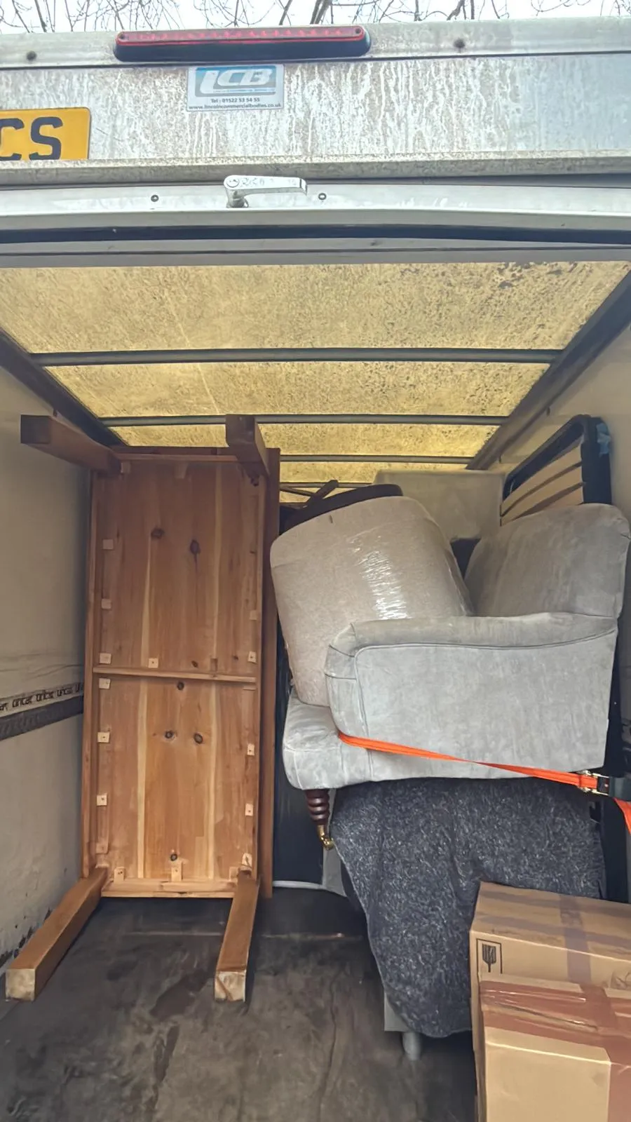 Furniture leaving an older Macclesfield home